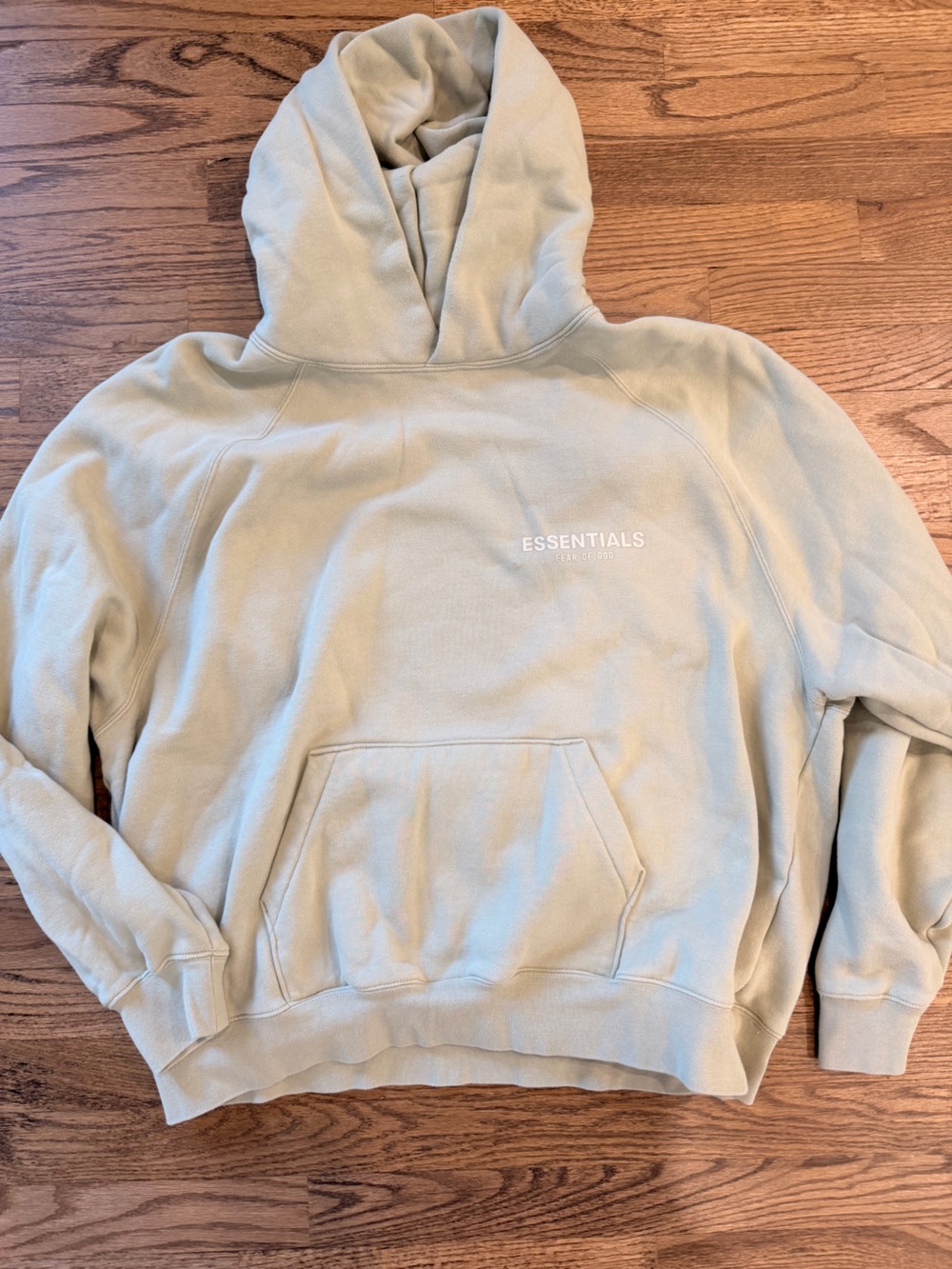Large Fear of God ESSENTIALS Hoodie in Light Green